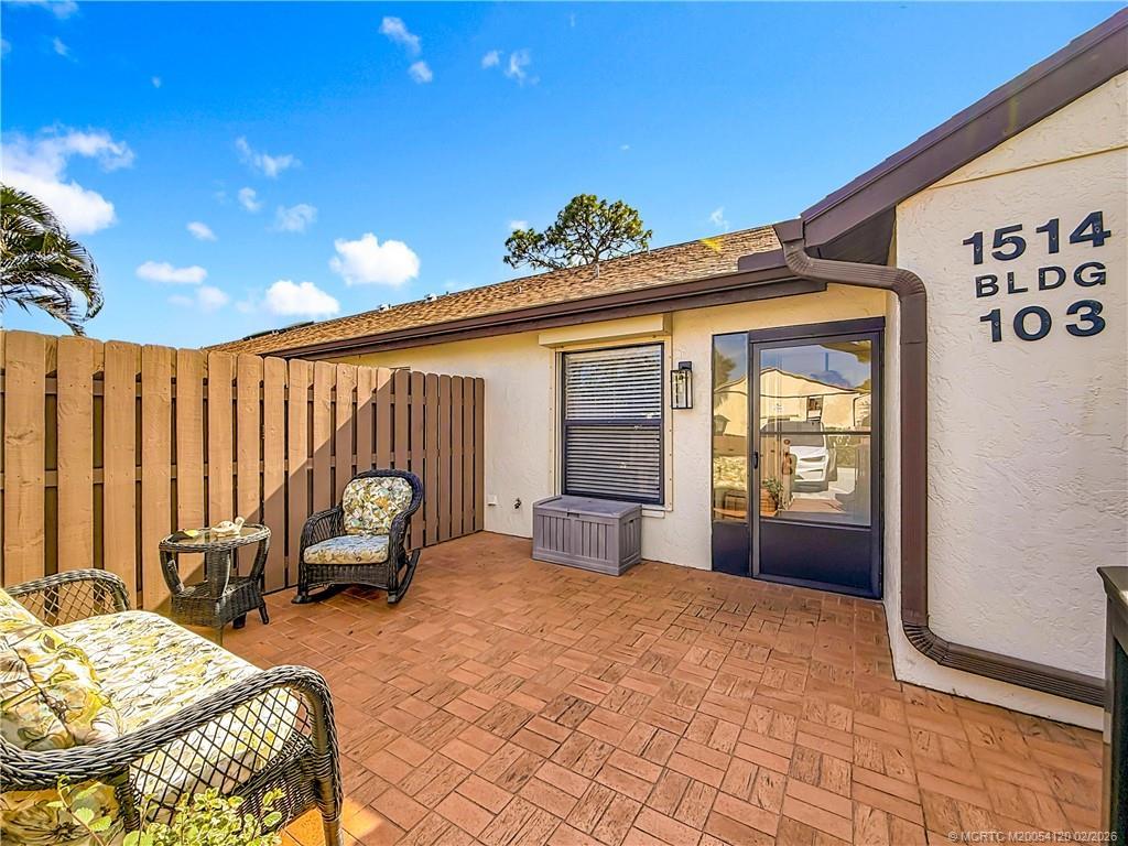 Image 3: Nice front patio. The outside of the home is all a