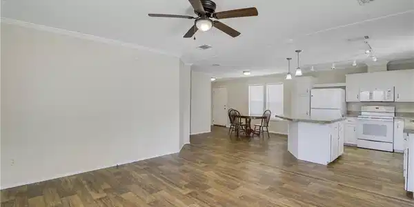 Image 3: Open concept - spacious living room plus dining ro