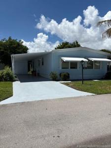 443 NE PINELAKE VILLAGE Boulevard