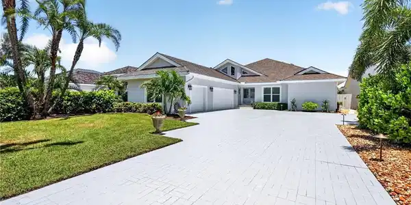 Image 2: Ample parking in this expanded driveway