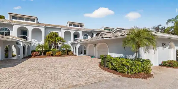 Image 3: Includes 1 Car Garage & Separate Golf Cart Garage