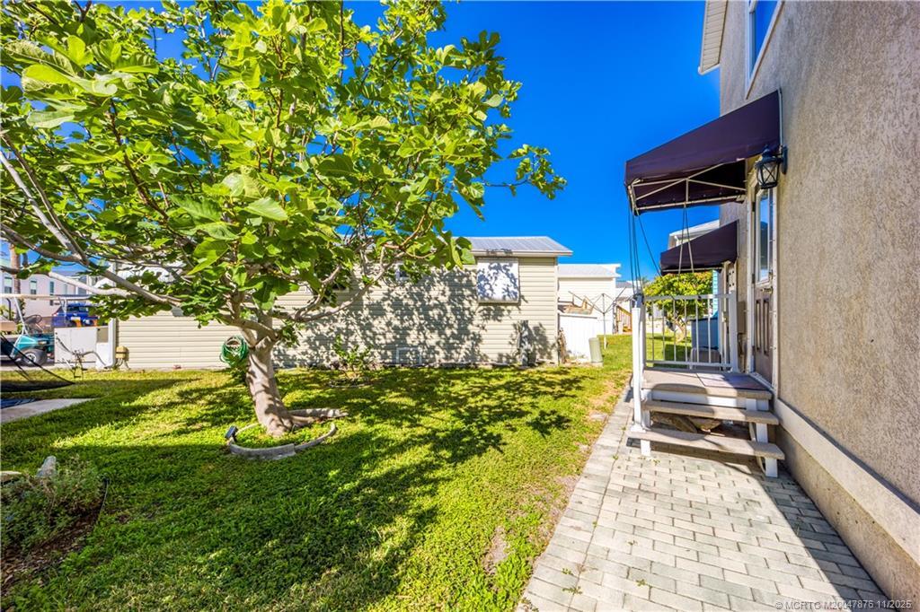 Image 3: Rare opportunity for yard and space for grilling.
