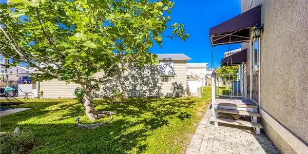 Image 3: Rare opportunity for yard and space for grilling.