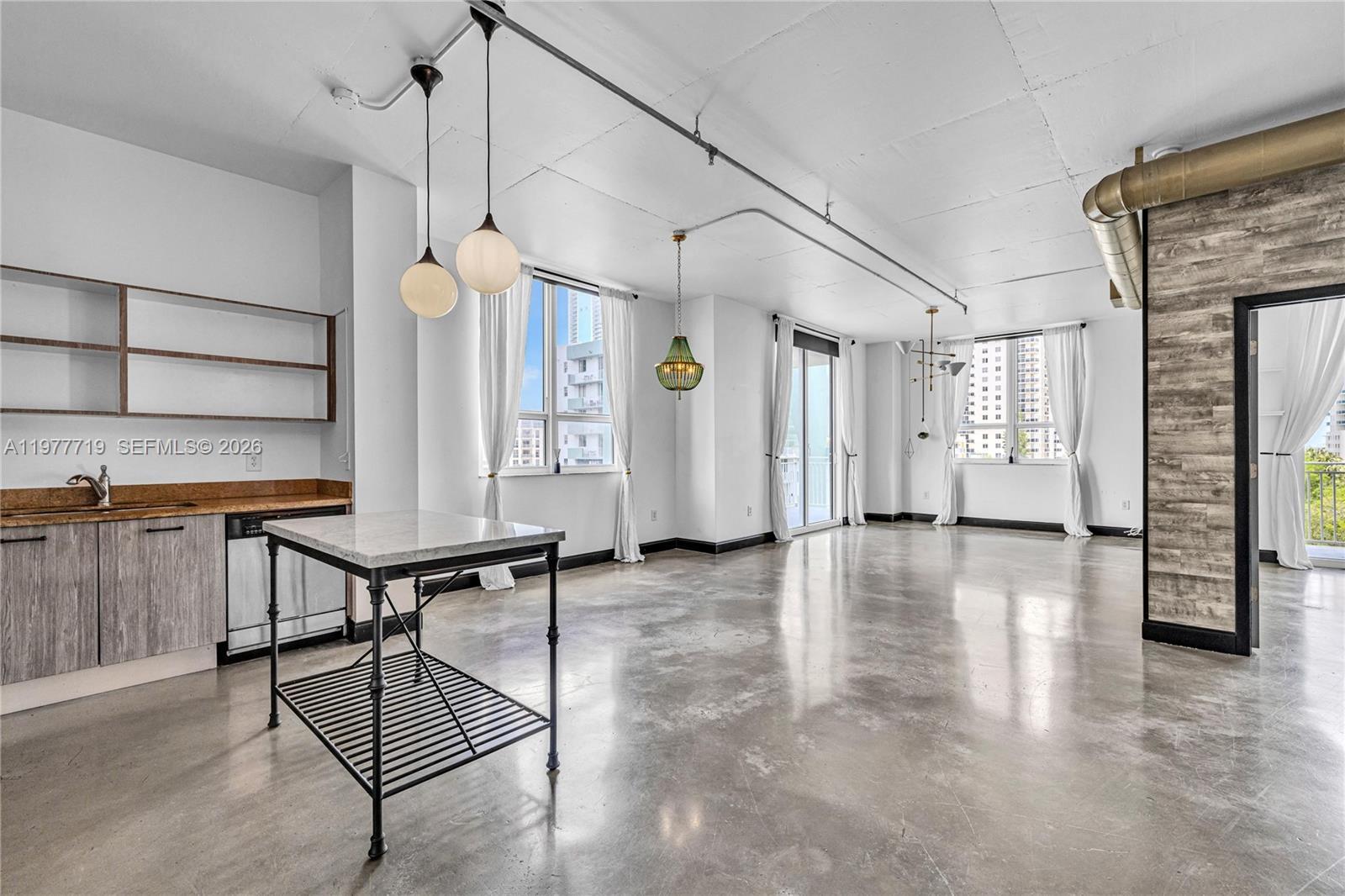 Image 2: Family Room/Social Areas//Kitchen