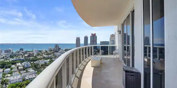 Image 4: STEP OUTSIDE ON YOUR EXTENDED BALCONY OVERLOOKING PARADISE!