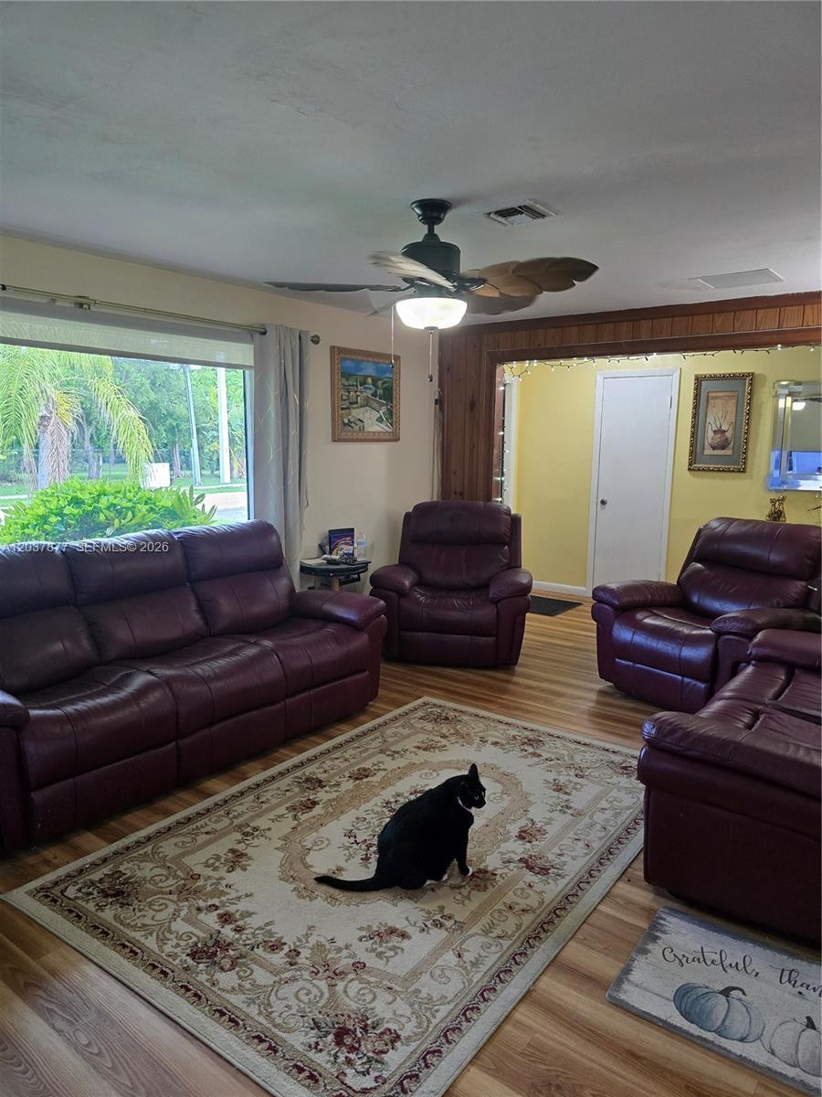 Image 2: The large picture window is made with impact glass and brings plenty of light in.