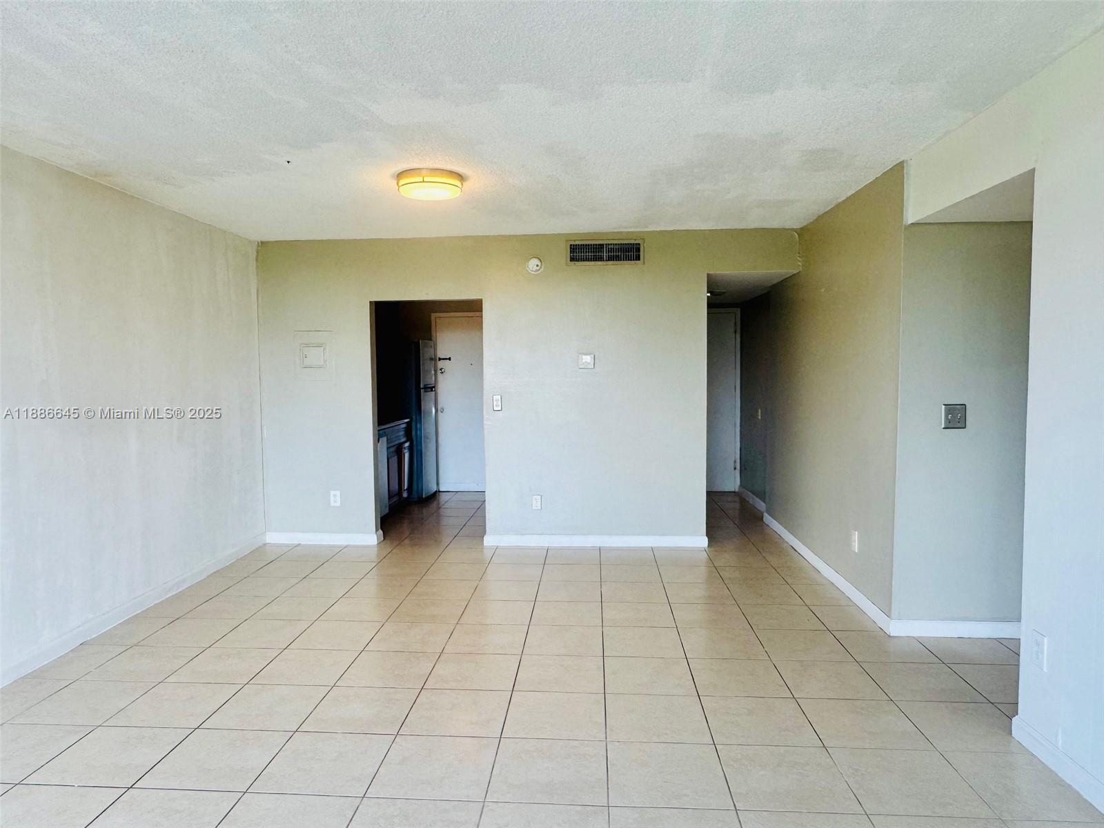 Image 4: Living Area Looking Towards Kitchen & Entrance Hall