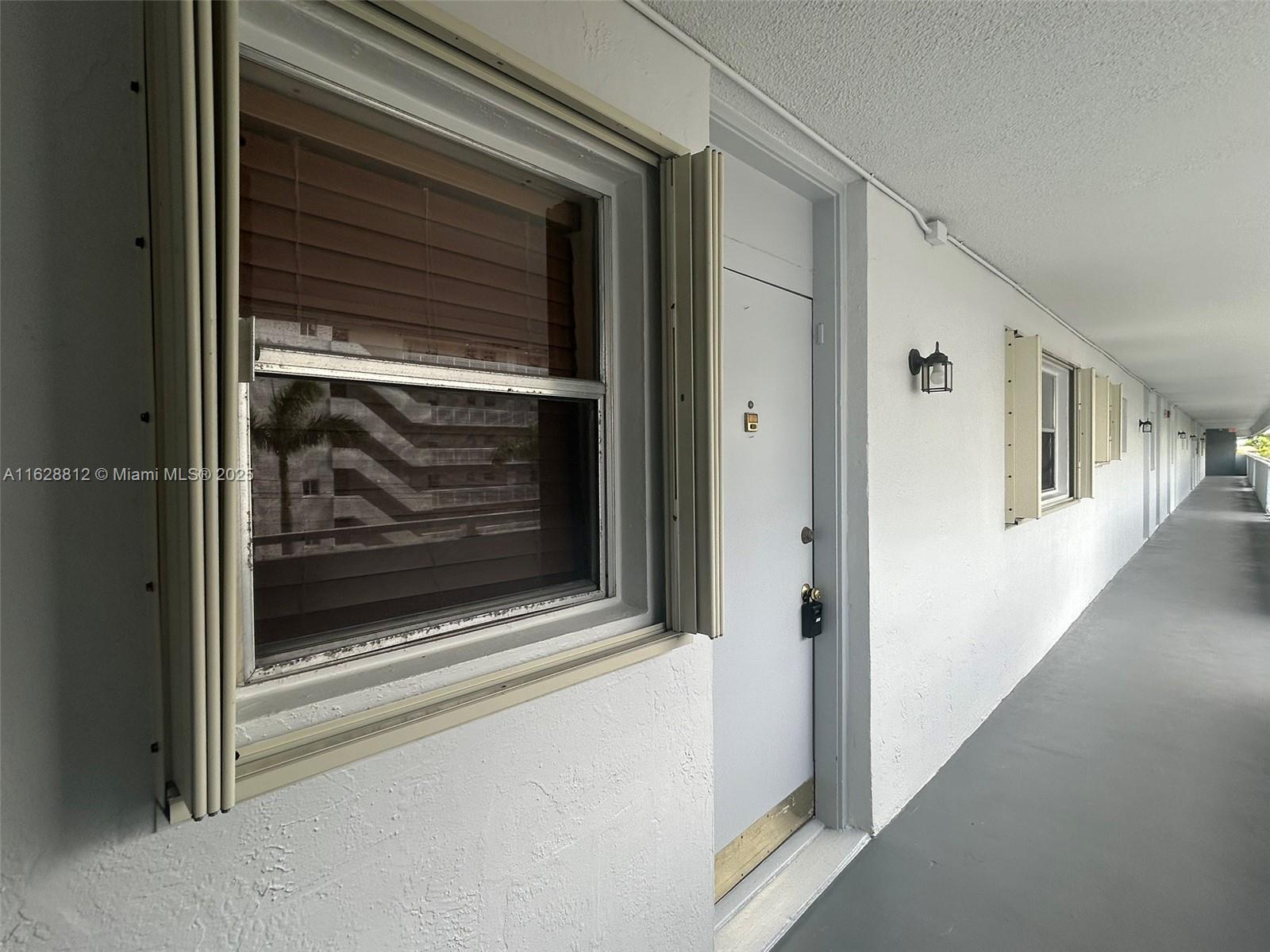 Image 3: Accordion Shutters