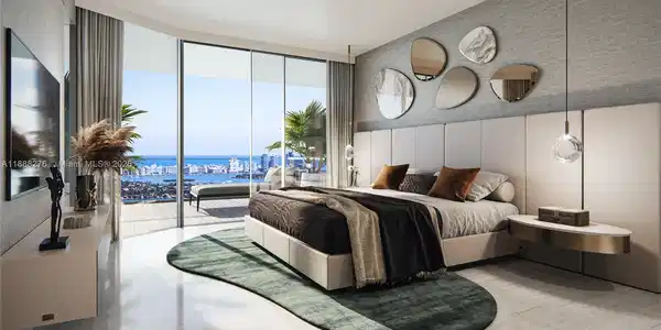 Image 4: primary bedroom with direct water view