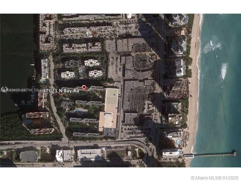 Image 3: Beach and ocean  close.