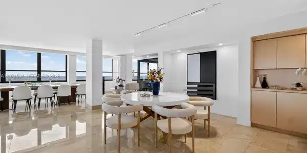 Image 4: Social Area with Built-in Bar and Cabinetry