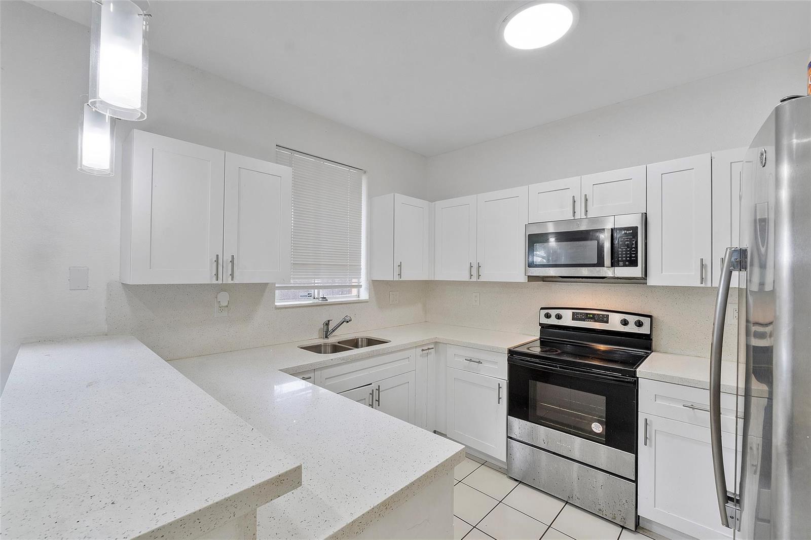 Image 2: KITCHEN ANGLE