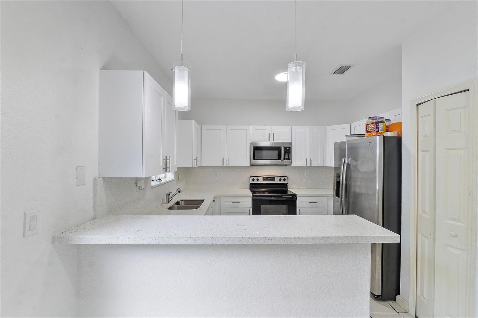 Image 3: FRONT KITCHEN VIEW