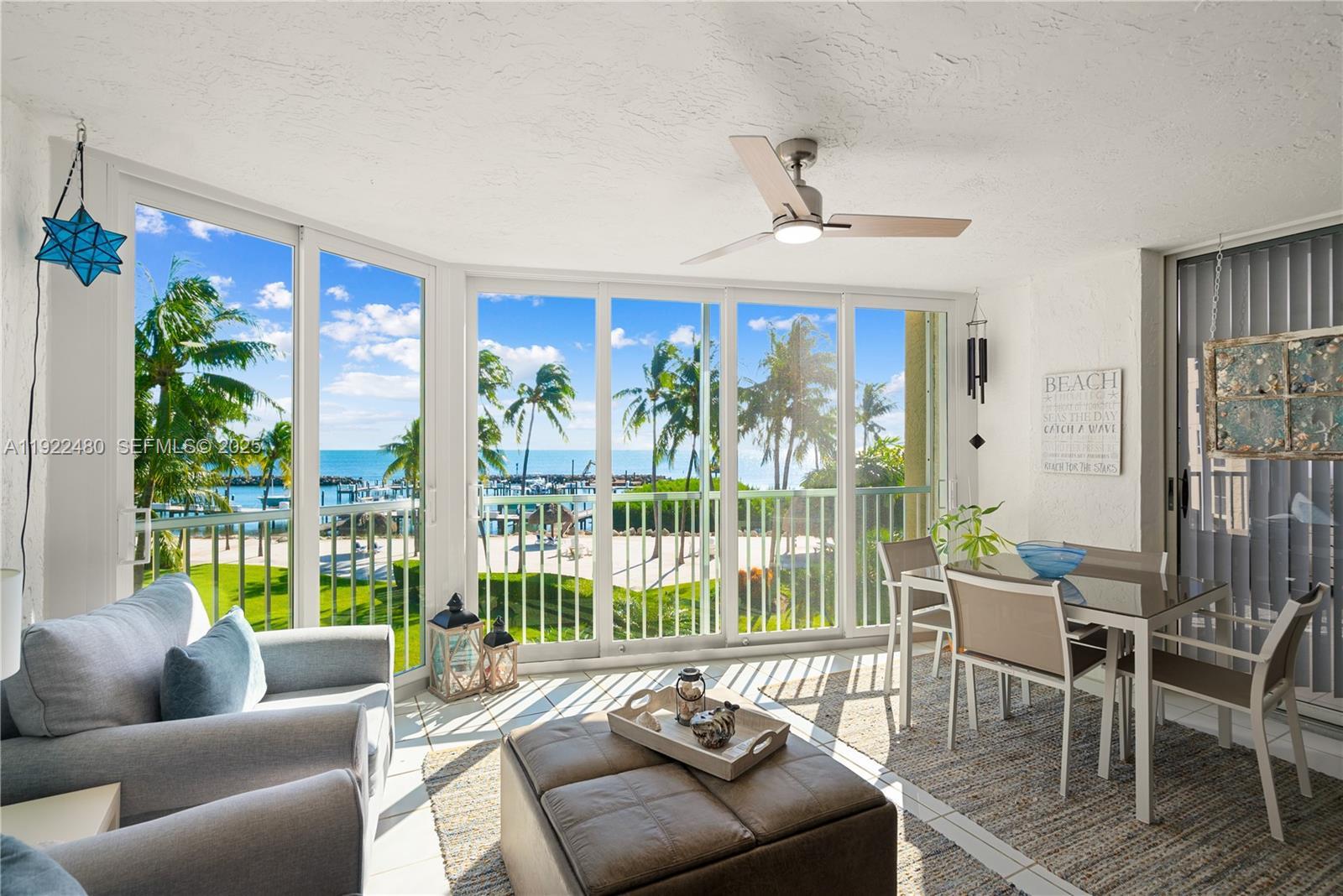 Image 1: Living Room to sitting area with ocean view