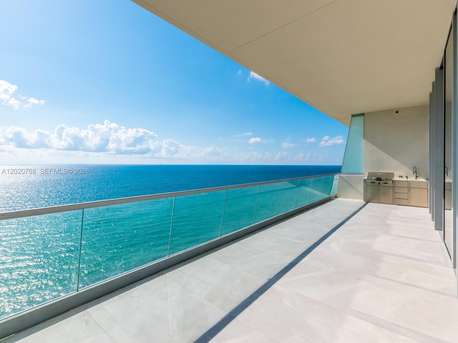 Image 2: SUNRISE TERRACE. Enjoy this stunning Ocean view from living area and master bedroom. Summer kitchen 