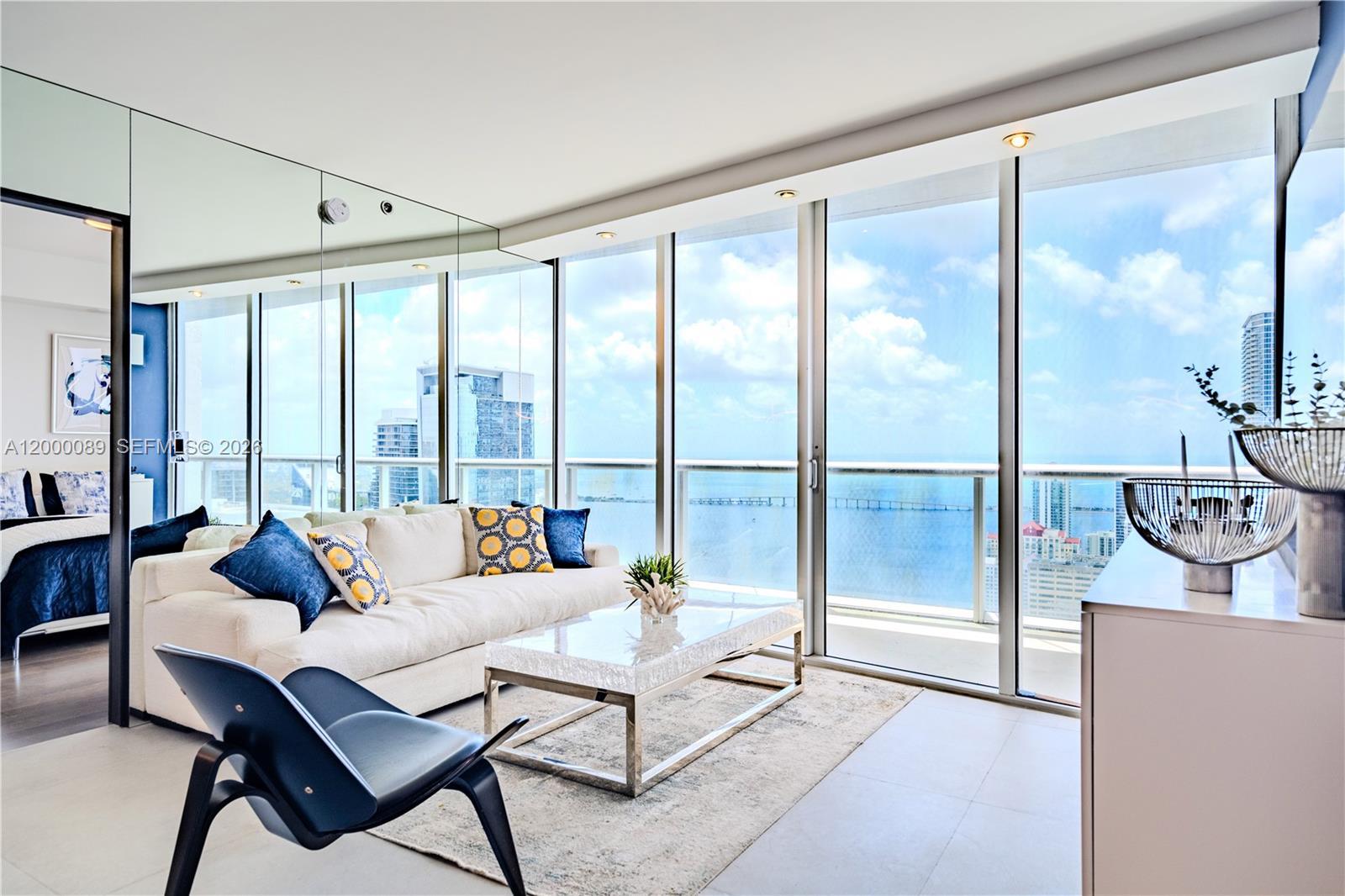 Image 2: Open space living with plenty of natural light to open your heart and mind to beautiful Miami ocean 