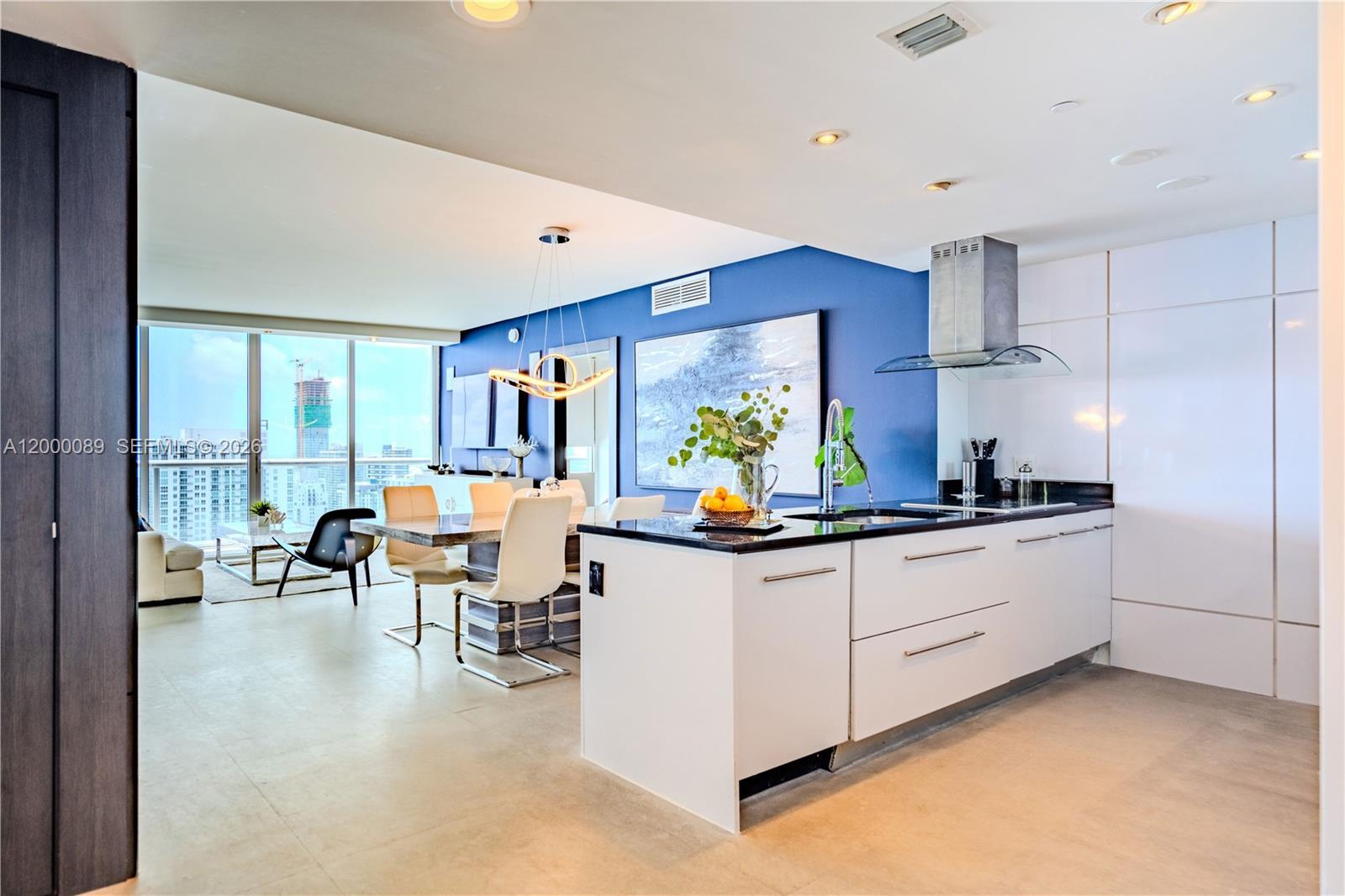 Image 4: Entrance/Hallway leading to the kitchen and open space living area