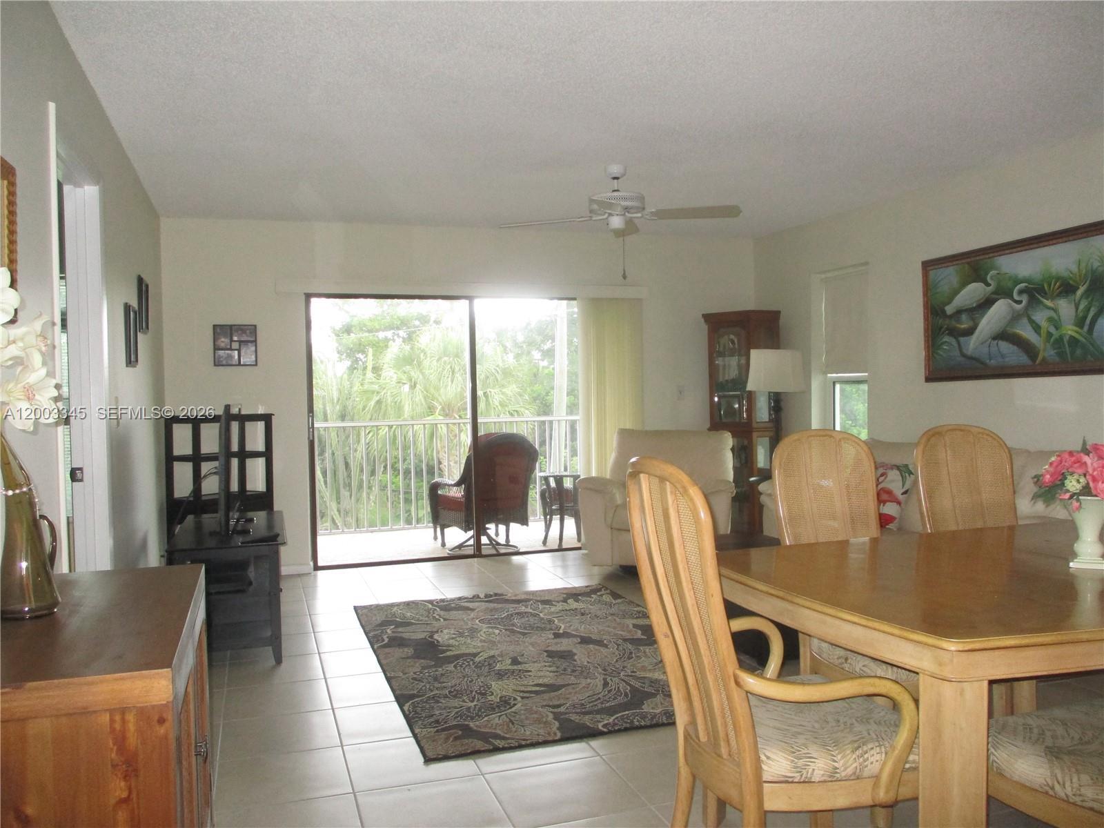 Image 1: ENTRANCE INTO THE CONDO THAT LEADS TO THE SCREENED PATIO