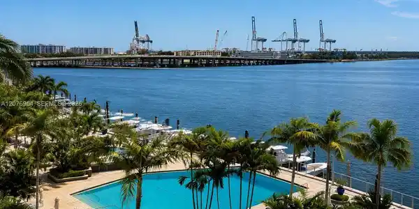 Image 3: Pool and bay views from the unit.