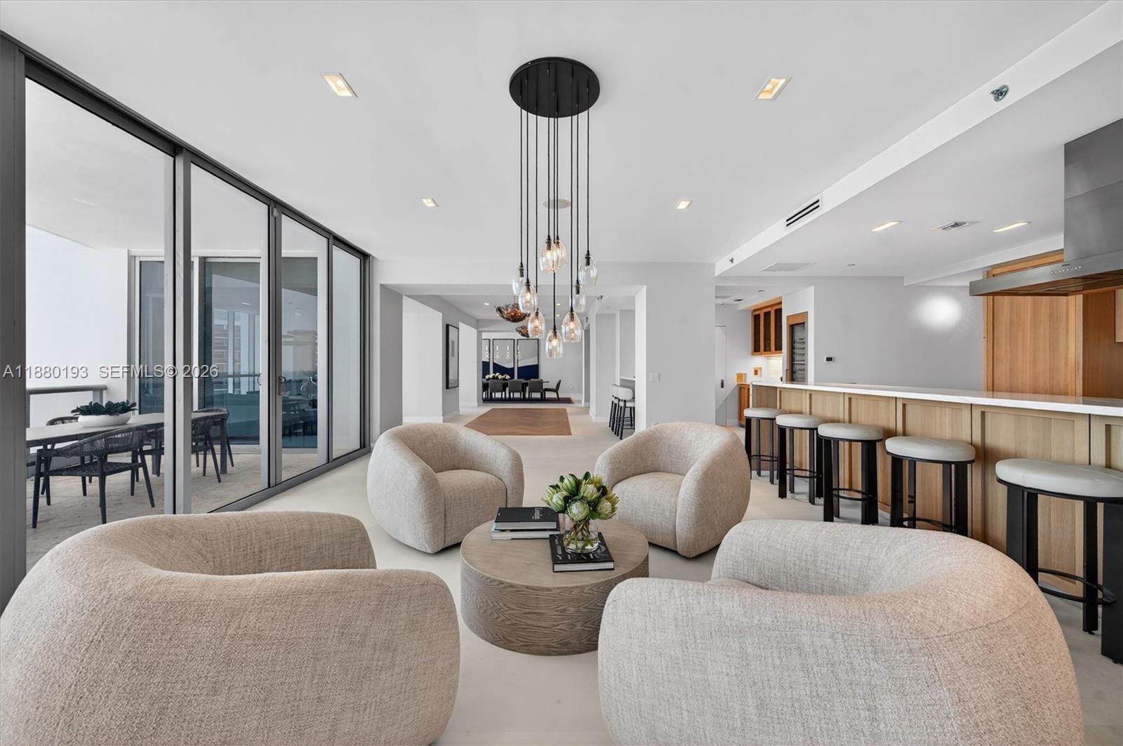 Image 3: Family Room, and Eat in Kitchen, Formal Dining in the Background