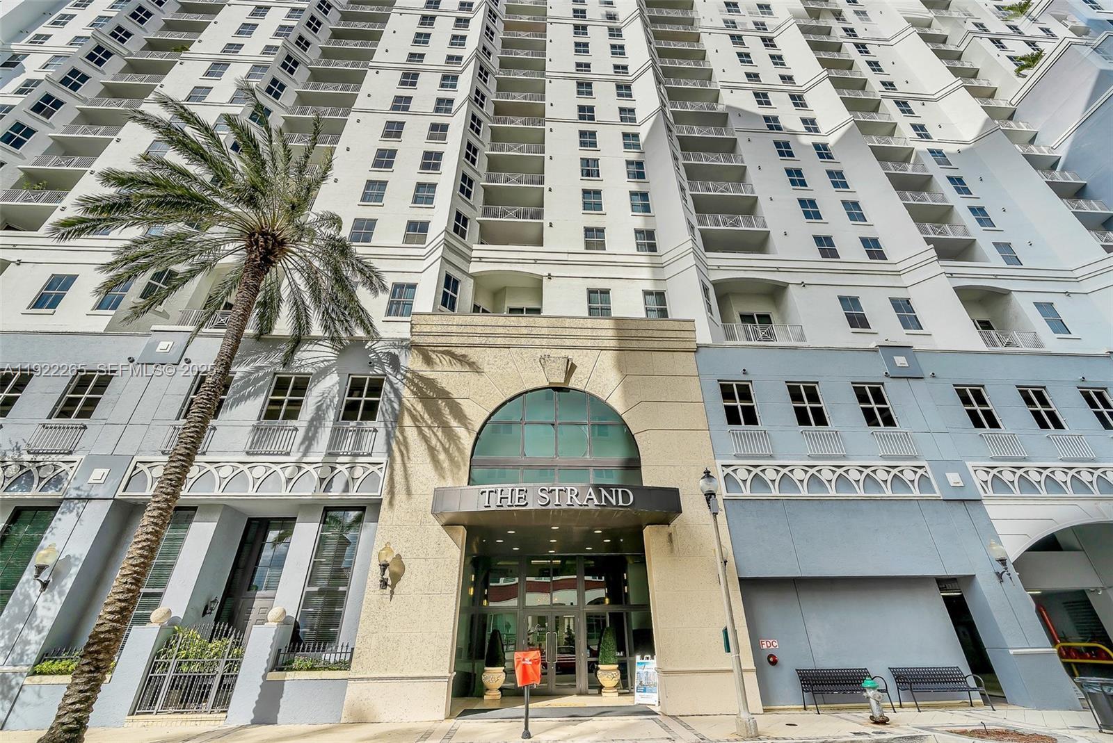 Image 1: Entrance with door man