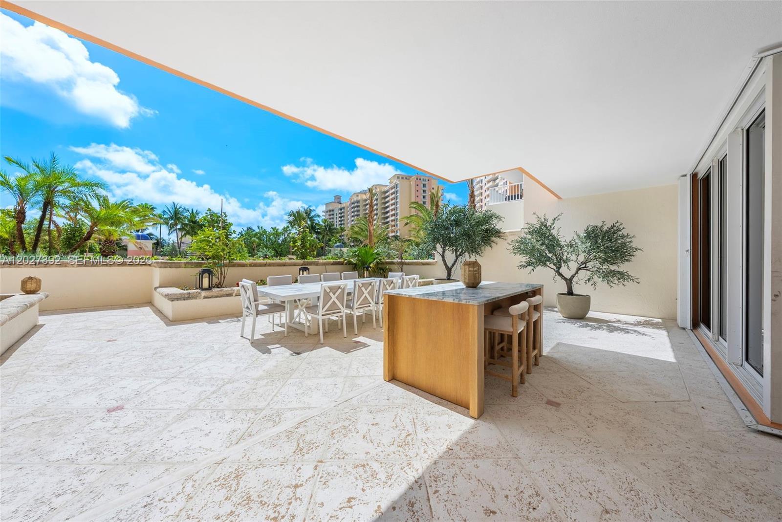 Image 4: Main terrace with direct access to the pool deck & beach