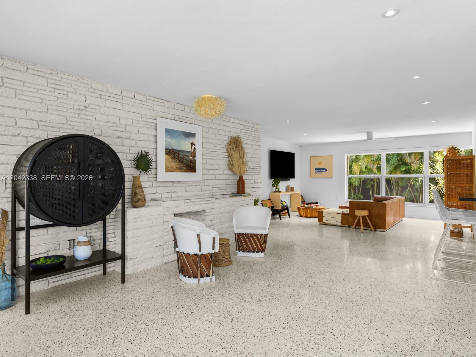 Image 3: Open-Flow Living Area with Newly Polished Terrazzo Floors