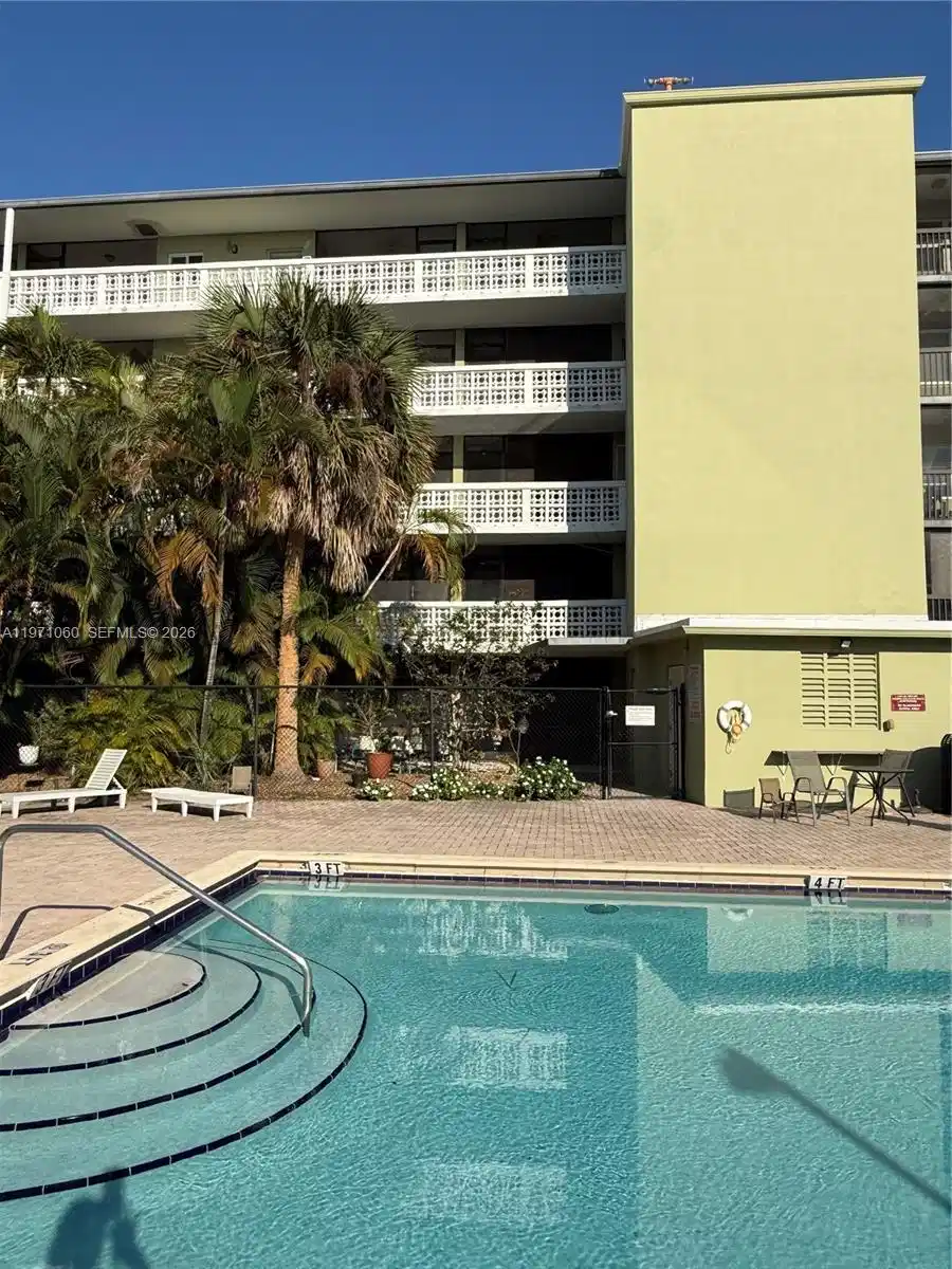 Image 1: Condo is on third floor, building is 5 stories