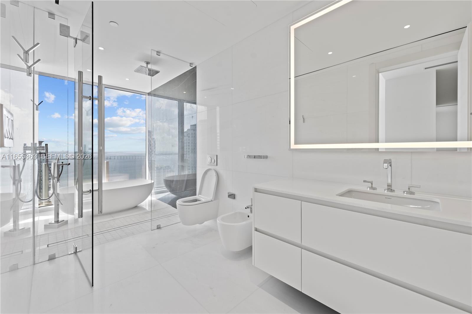Image 4: Master hers bath.