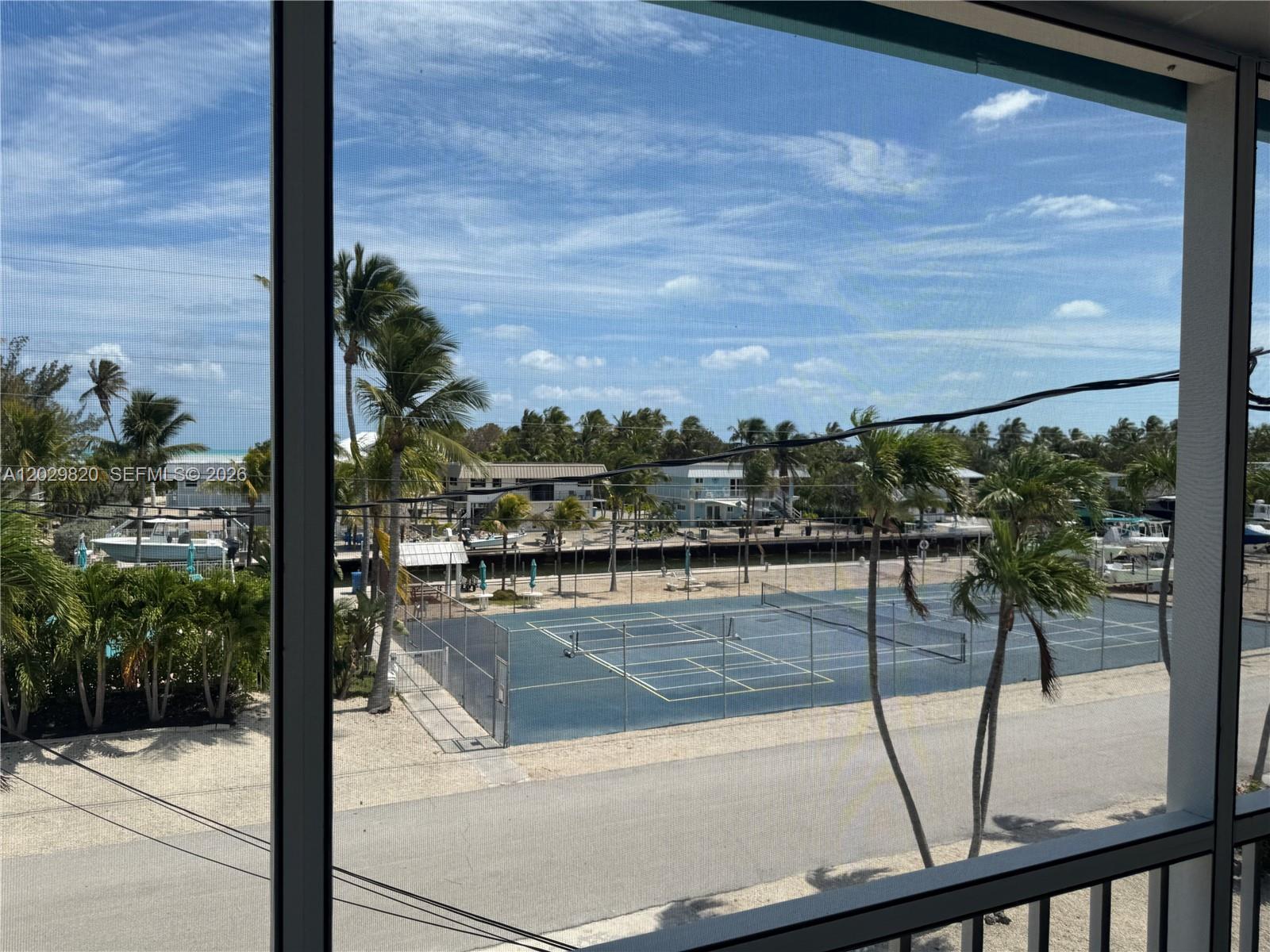 Image 2: Balcony View of Docks and Canal