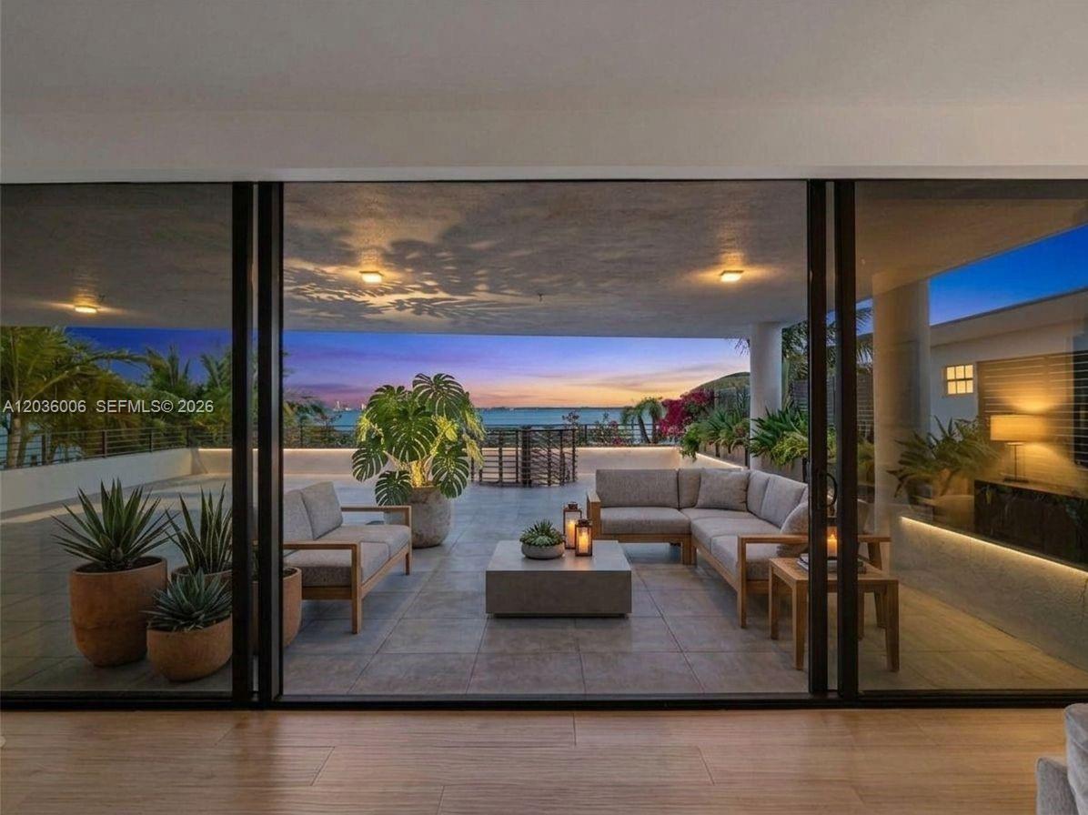 Image 1: Large balcony facing Direct Bay Views