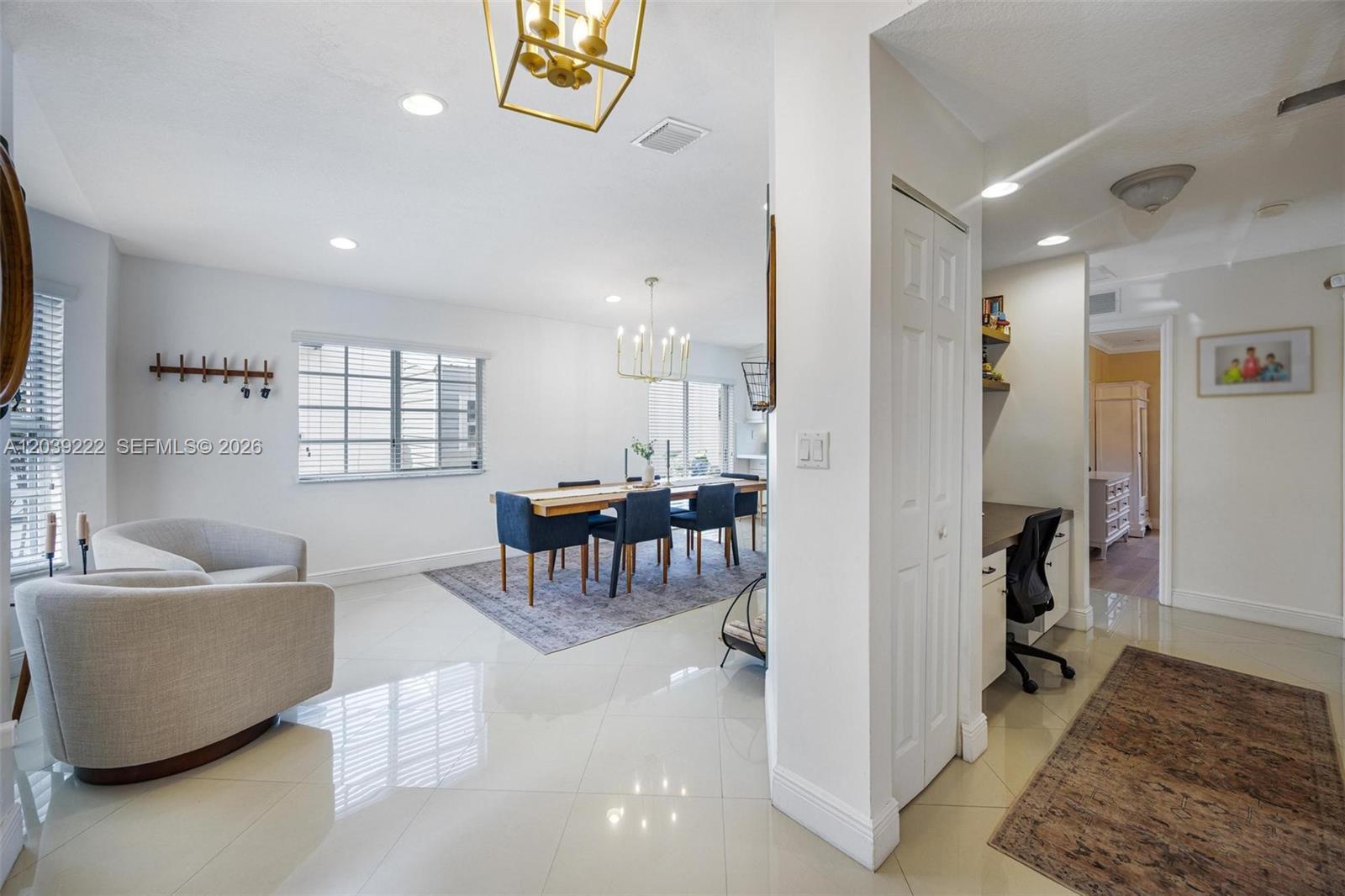 Image 3: Sitting room dining and kitchen to left.  bedrooms and living room to the right