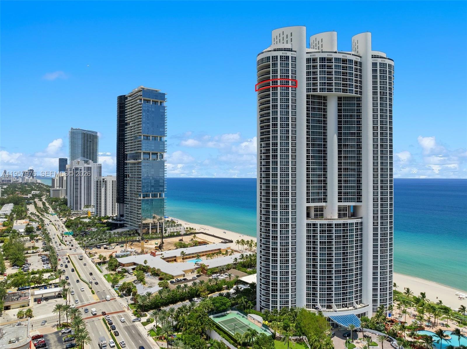Image 4: Prestigious oceanfront tower along iconic Collins Avenue in Sunny Isles Beach.