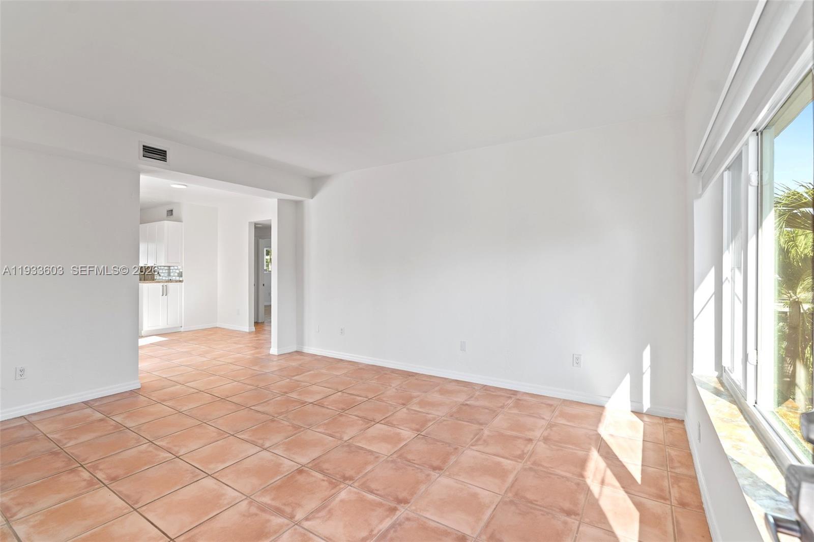 Image 3: High Ceilings and lots of windows bring in tons of natural light