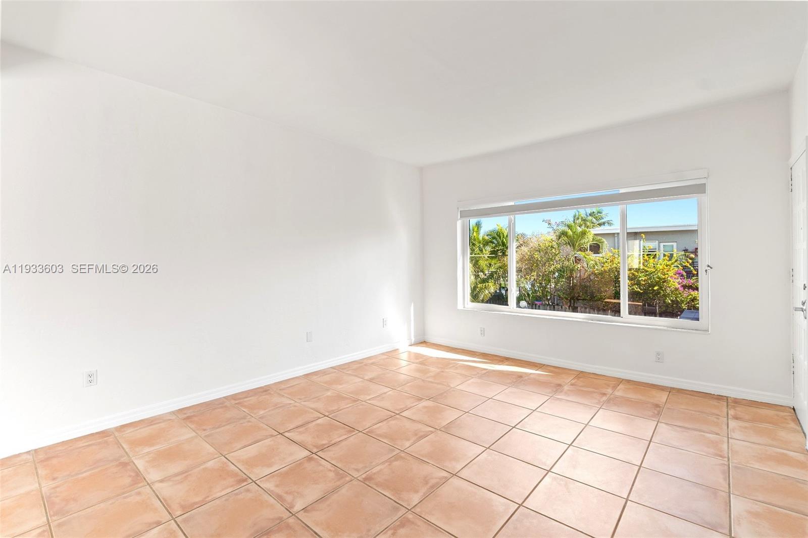 Image 4: High Ceilings and lots of windows bring in tons of natural light