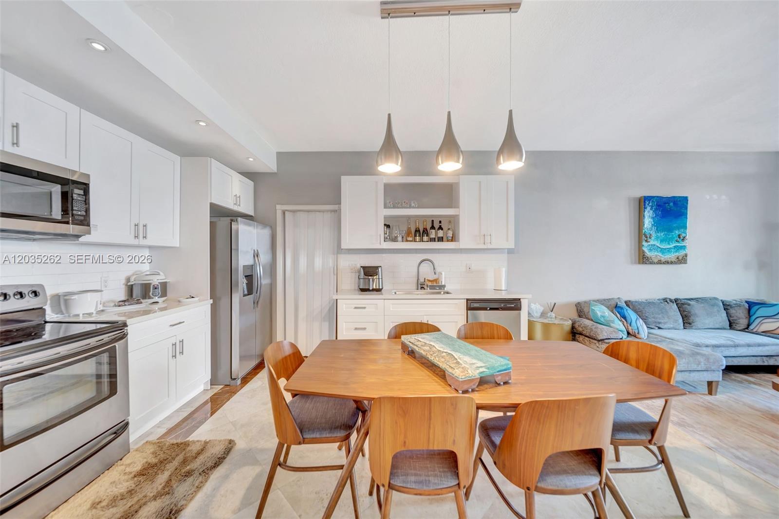 Image 2: Dining/Kitchen