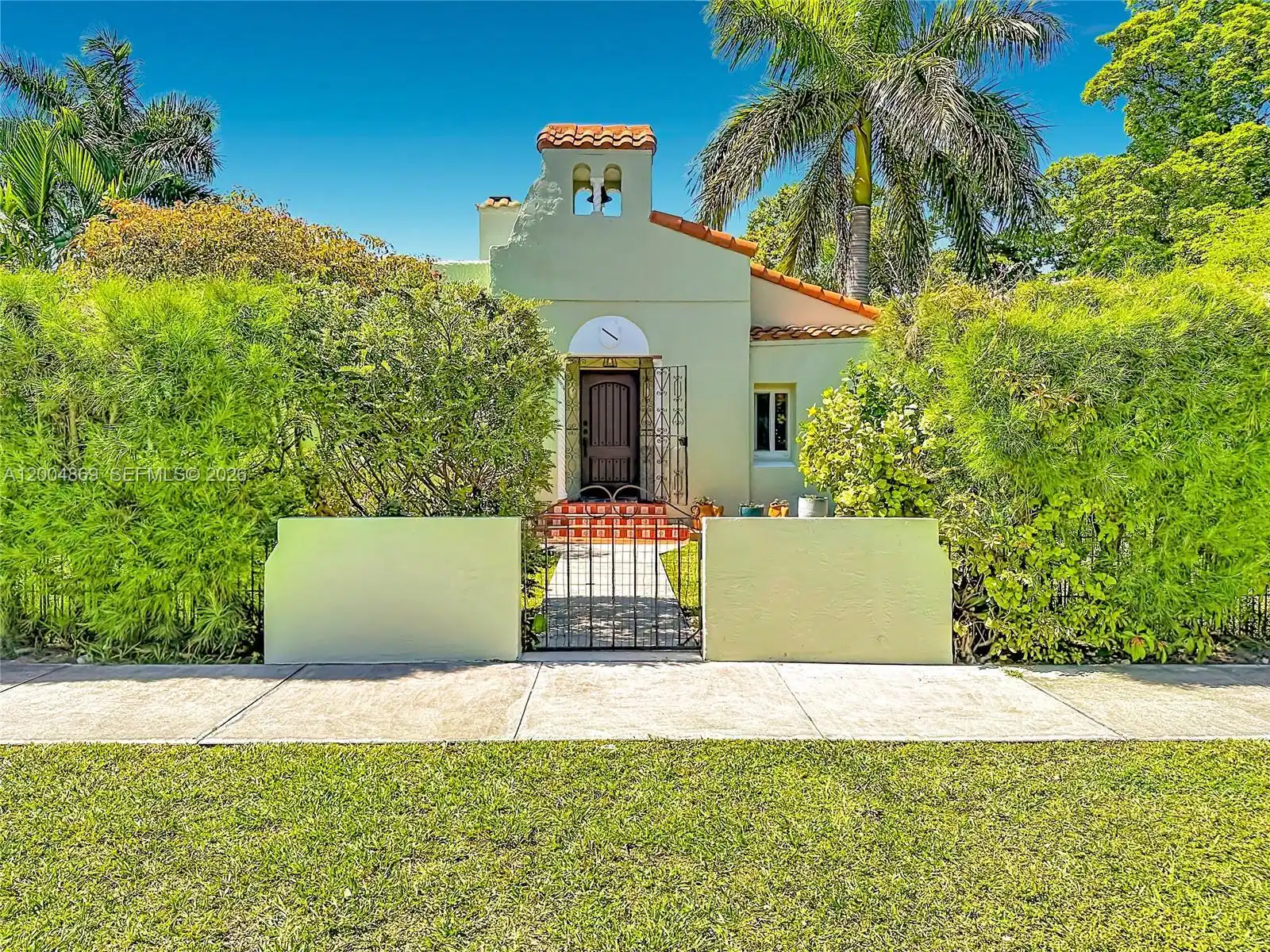 Image 1: Rubish & Hunter designed Mediterranean Revival home