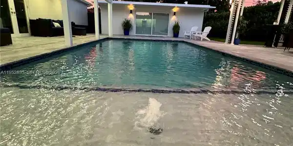 Image 3: Sun setting from the pool