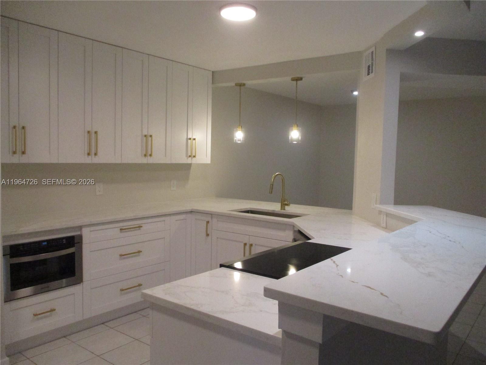 Image 1: UPDATED OPEN KITCHEN INTO DINING & LIVING AREA