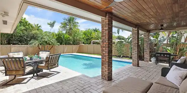 Image 4: Covered Veranda overlooking the Sparkling Pool