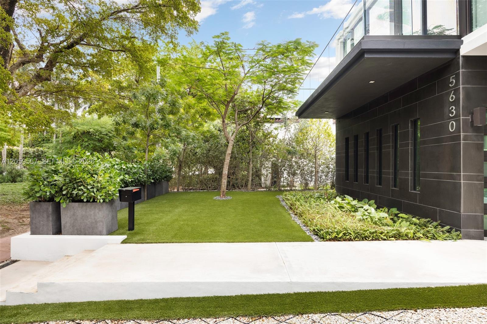 Image 2: Front yard view