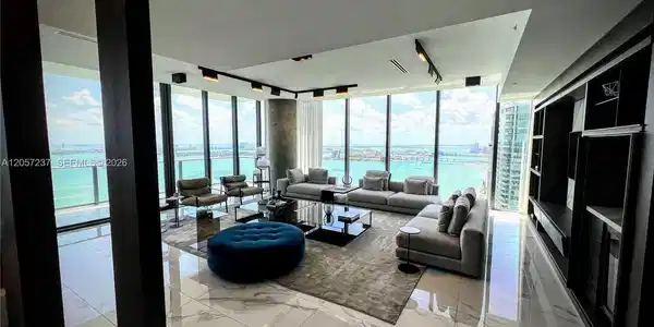 Image 3: Expanded living room, high end built ins