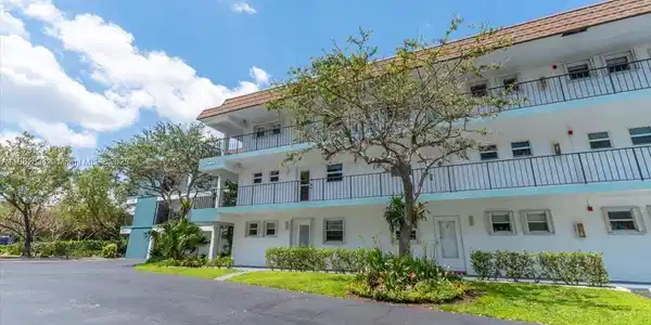 Image 2: East side of building where unit is located on 2nd floor