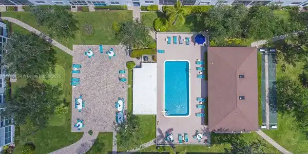Image 3: Aerial view of pool and courtyard area