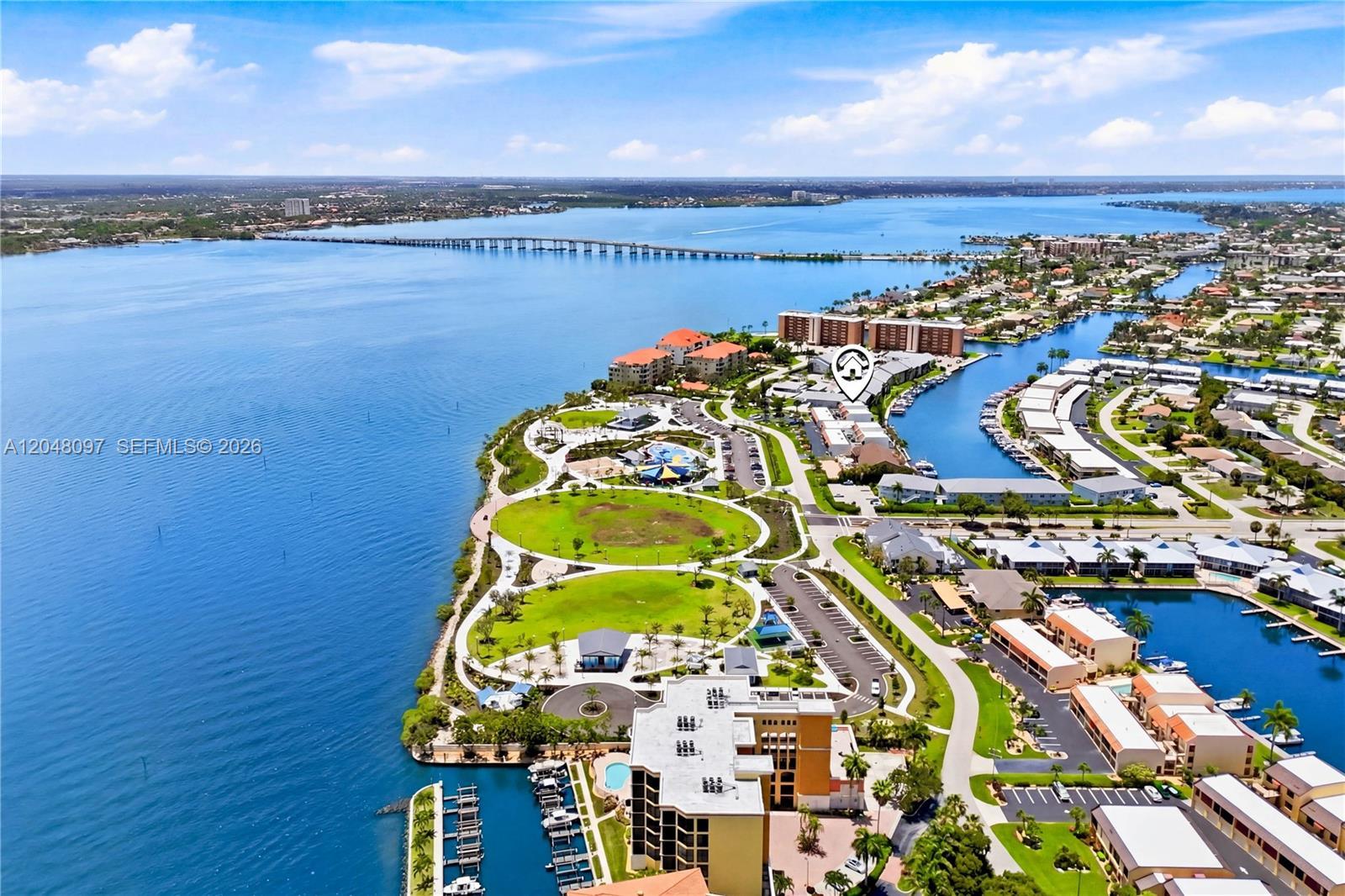 Image 3: Located directly across from the exciting JAYCEE PARK in the highly desirable BEACH PARKWAY PROMENAD