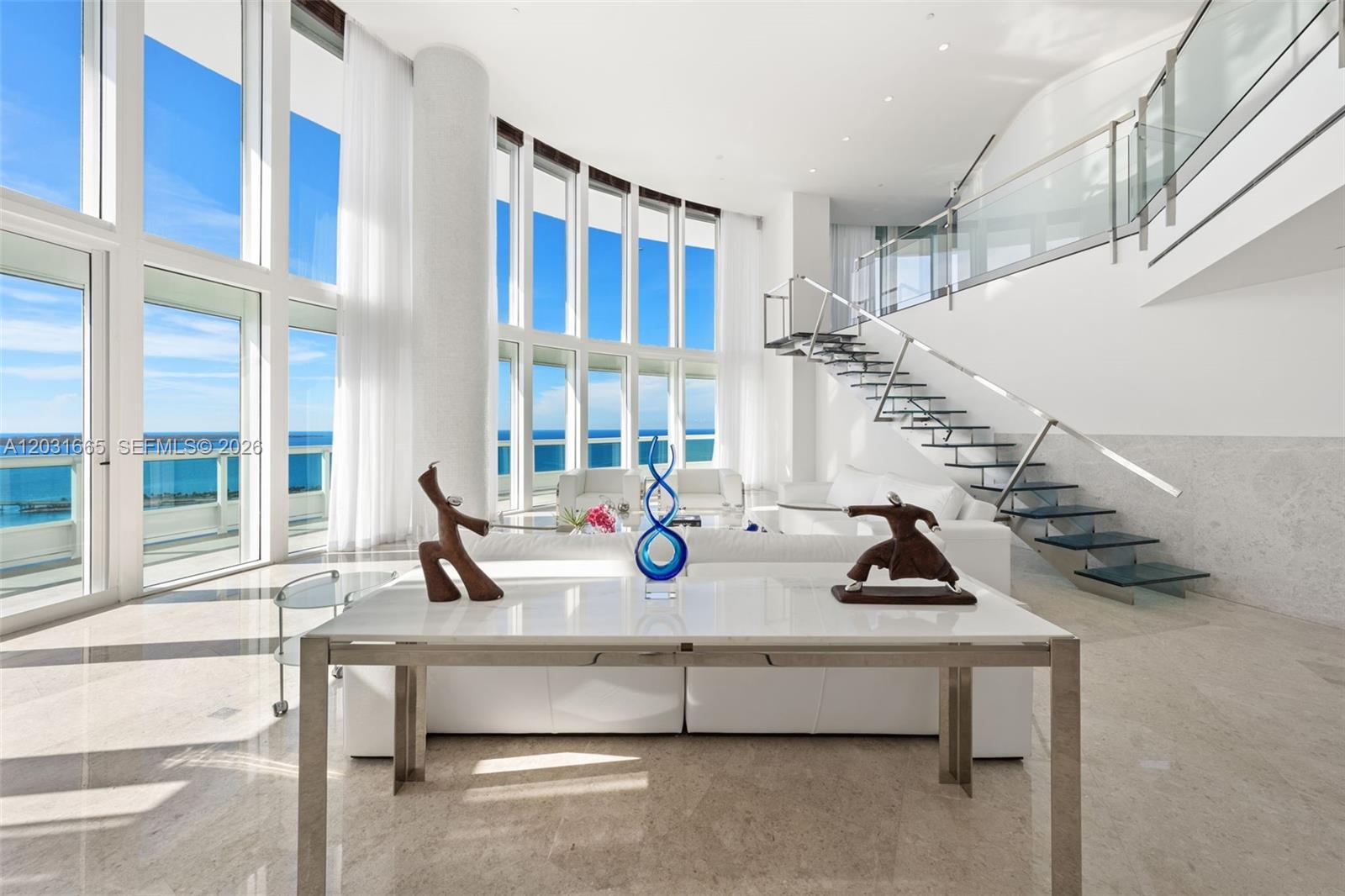 Image 2: Living Room with dramatic 20 ft. ceilings
