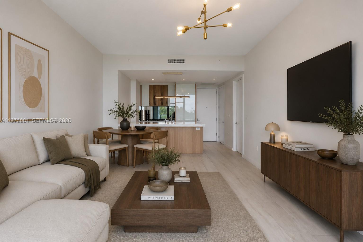 Image 2: Effortless open living beneath garden views &mdash; anchored by a true chef's kitchen with gas cooki