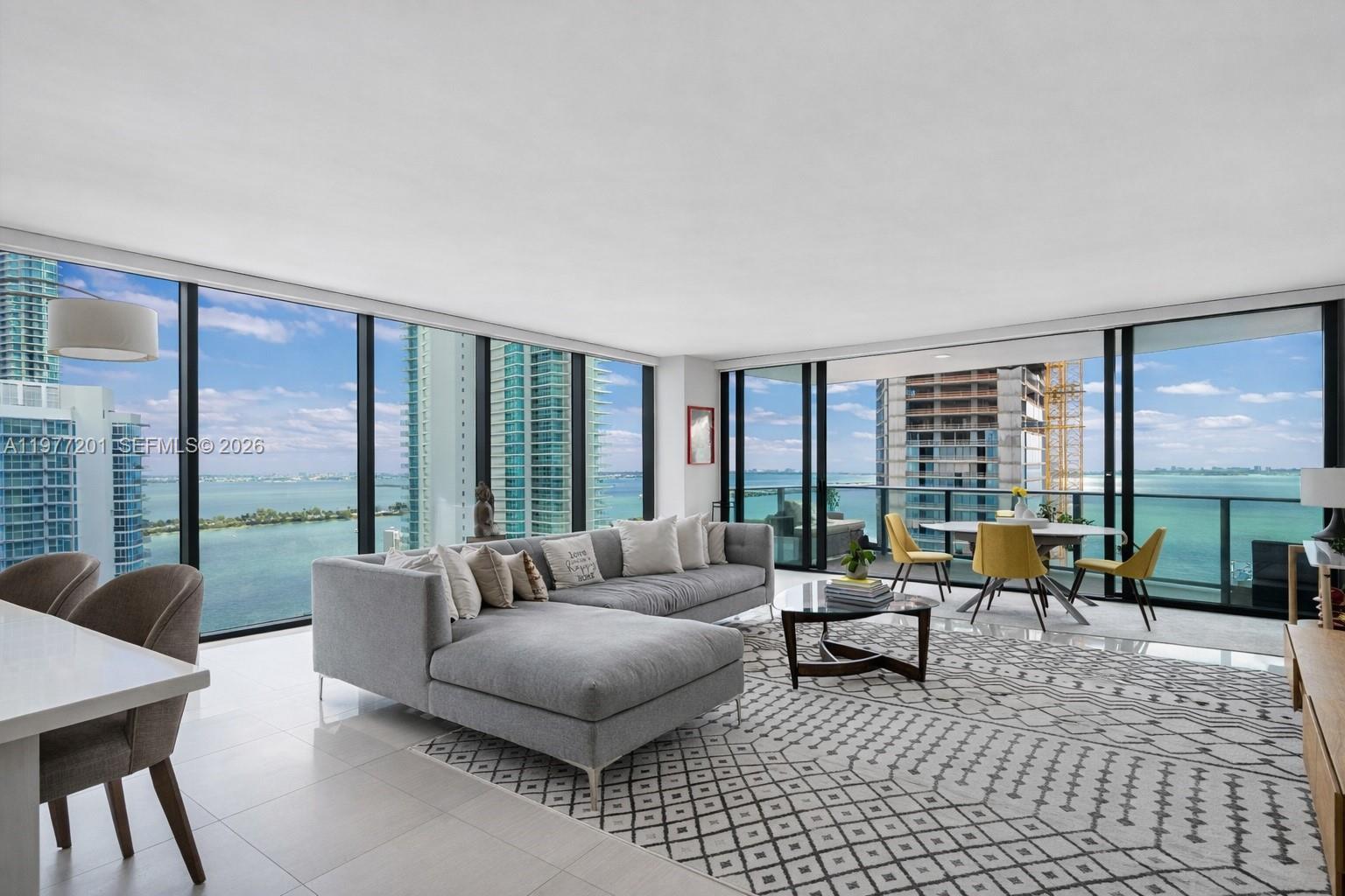Image 1: Corner Condo, Living Room with Bay Views