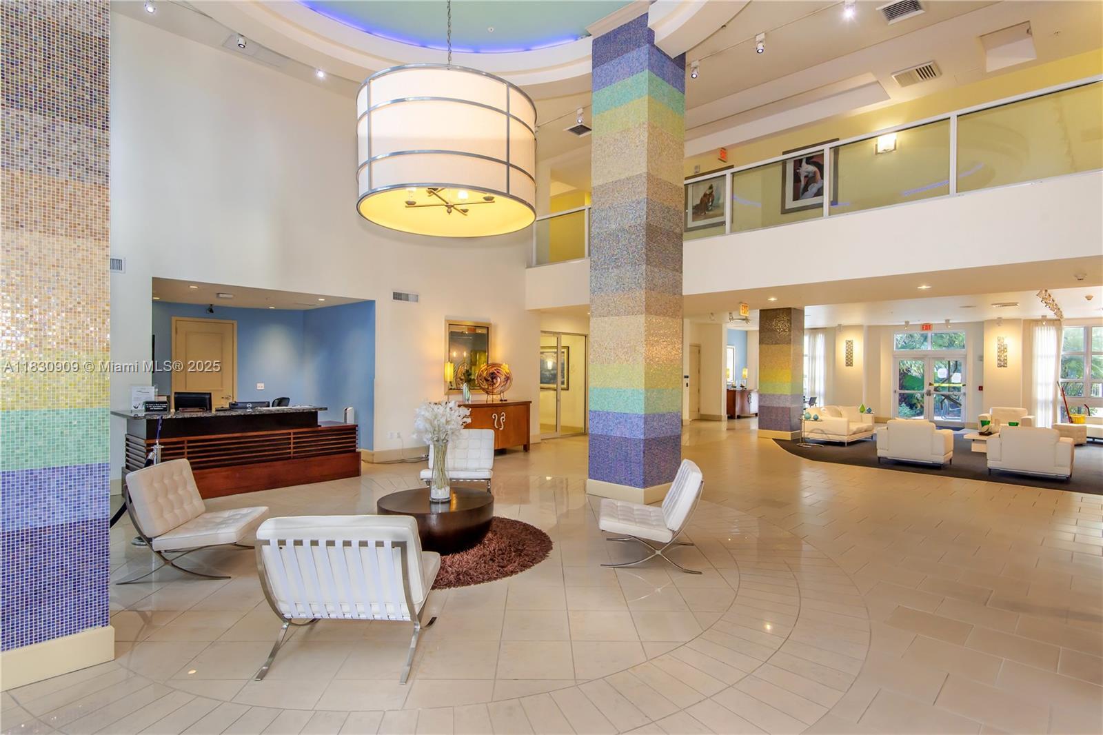 Image 4: Impressive 2-story lobby.