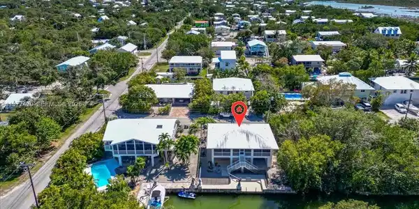 Image 4: Aerial perspective showing the canal location within the Eden Pines neighborhood.